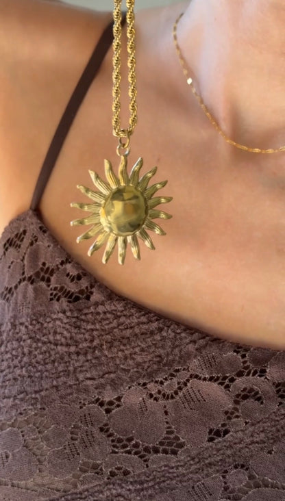 Aura Sun Charm