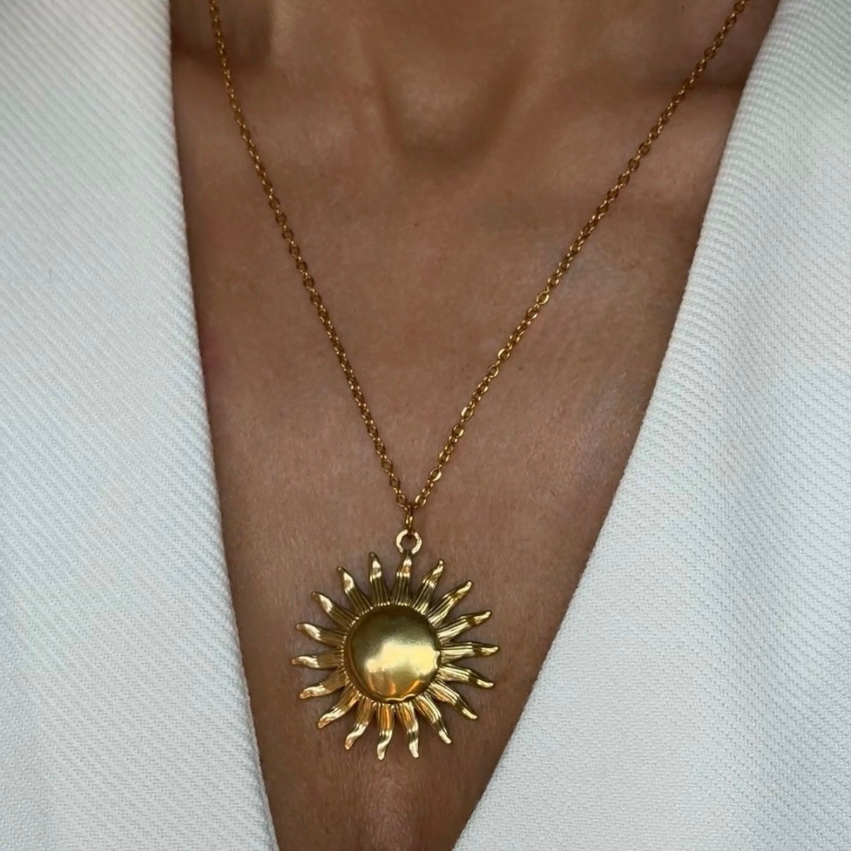 Aura Sun Charm
